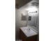 Modern bathroom vanity with bright lighting and updated fixtures at 1608 N Torrey Pines Dr # 103, Las Vegas, NV 89108