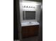 Bathroom with vanity, modern lighting, and mirrored medicine cabinet at 1608 N Torrey Pines Dr # 103, Las Vegas, NV 89108