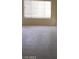 A large picture window gives lots of natural light into the living area at 1608 N Torrey Pines Dr # 103, Las Vegas, NV 89108