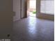Open living space with tiled floors and plenty of natural light at 1608 N Torrey Pines Dr # 103, Las Vegas, NV 89108