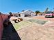 Expansive backyard with unique landscaping, and a spacious area. Ready for your personal touches at 1860 Banaba Ln, Las Vegas, NV 89156