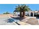 Well-kept front yard with lush palm trees and desert landscaping offering curb appeal at 1860 Banaba Ln, Las Vegas, NV 89156