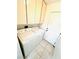Bright laundry room with tile floor, ample cabinets, washer, and dryer ready for use at 1860 Banaba Ln, Las Vegas, NV 89156