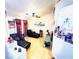Inviting living room featuring wood-look floors and comfortable leather seating at 1860 Banaba Ln, Las Vegas, NV 89156