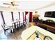 Spacious living and dining area with fireplace and hardwood floors at 1860 Banaba Ln, Las Vegas, NV 89156