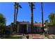 Beautiful single-story home with mature palm trees, a red tile roof, and a welcoming entrance at 2231 S Tioga Way, Las Vegas, NV 89117