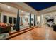 Spacious outdoor patio with comfortable seating areas and dining spaces, perfect for entertaining guests or relaxing outdoors at 2231 S Tioga Way, Las Vegas, NV 89117