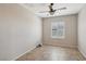 Cozy bedroom with tile flooring, ceiling fan and plantation shutters at 2284 Carambala Ln, Henderson, NV 89044