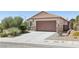 Inviting single-story home featuring low-maintenance landscaping and a two-car garage at 2284 Carambala Ln, Henderson, NV 89044