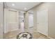 Welcoming home foyer with tile floors and decorative medallion design at 2284 Carambala Ln, Henderson, NV 89044