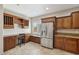 Charming kitchen featuring stainless steel appliances, a dedicated workstation, and wine storage at 2284 Carambala Ln, Henderson, NV 89044