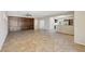 Expansive living room boasting custom built-ins and seamless flow to the kitchen area at 2284 Carambala Ln, Henderson, NV 89044