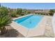 Inviting backyard pool offering a refreshing retreat with nice landscaping at 2284 Carambala Ln, Henderson, NV 89044