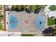 Aerial view of the outdoor basketball court surrounded by greenery and walking paths at 236 Dog Leg Dr, Las Vegas, NV 89148