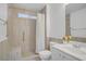 Bathroom with walk-in shower and white vanity offers a clean, modern feel at 236 Dog Leg Dr, Las Vegas, NV 89148
