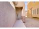 Covered entryway leading to the front door enhances the home's curb appeal at 236 Dog Leg Dr, Las Vegas, NV 89148