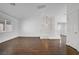 Hallway featuring hardwood floors, white walls, open sight lines and bright lighting at 236 Dog Leg Dr, Las Vegas, NV 89148