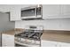 Kitchen featuring stainless steel appliances, brown countertops, and a gas cooktop at 236 Dog Leg Dr, Las Vegas, NV 89148