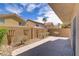 Private patio with patterned concrete and block wall fencing at 236 Dog Leg Dr, Las Vegas, NV 89148