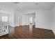 An upstairs landing area with hardwood floors, neutral walls, and open floor plan at 236 Dog Leg Dr, Las Vegas, NV 89148