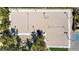 Aerial view of sand volleyball court with surrounding trees, next to a parking spot at 236 Dog Leg Dr, Las Vegas, NV 89148