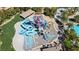 Water park aerial view showcases elaborate slides, pool and surrounding palm trees at 236 Dog Leg Dr, Las Vegas, NV 89148