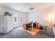Versatile room bathed in natural light with flexible space, neutral tones and office set up at 2413 Mourning Warbler Ave, North Las Vegas, NV 89084