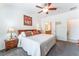 Bright main bedroom featuring a plush bed, and soft carpet at 2413 Mourning Warbler Ave, North Las Vegas, NV 89084