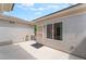 Private outdoor patio space offering security gate and potential for customization at 2413 Mourning Warbler Ave, North Las Vegas, NV 89084