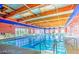 Indoor pool with skylights offers year-round swimming and recreation at 2413 Mourning Warbler Ave, North Las Vegas, NV 89084