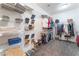 Organized walk-in closet with ample shelving and hanging space at 2413 Mourning Warbler Ave, North Las Vegas, NV 89084
