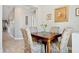 Dining room featuring a dark wood table and four cushioned chairs at 2425 Sturrock Dr, Henderson, NV 89044
