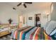 Relaxing bedroom with well-placed lighting, a dresser and an organized closet at 251 S Green Valley Pkwy # 2821, Henderson, NV 89012