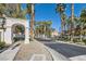 Elegant community entrance featuring the 'Bella Vista' sign and lush landscaping at 251 S Green Valley Pkwy # 2821, Henderson, NV 89012