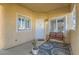 Inviting front porch featuring a bench, potted plant, and stylish rug at 251 S Green Valley Pkwy # 2821, Henderson, NV 89012