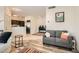 Open floorplan with wood floors, connecting the living room and kitchen, with modern appliances at 251 S Green Valley Pkwy # 2821, Henderson, NV 89012
