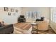 Bright living room features neutral paint, wood floors, and a large window with shutter-style blinds at 251 S Green Valley Pkwy # 2821, Henderson, NV 89012