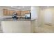 The kitchen offers stainless steel appliances, lots of cabinets, and a breakfast bar at 2538 Capella Star St, Henderson, NV 89044