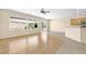 Bright living room with an open floor plan featuring backyard access at 2538 Capella Star St, Henderson, NV 89044