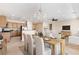 Open floor plan featuring dining area, living room and kitchen at 2538 Capella Star St, Henderson, NV 89044