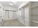 Spacious walk-in closet with ample shelving and hanging space for optimal organization at 2538 Capella Star St, Henderson, NV 89044
