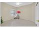 Spacious bedroom with tile flooring, and natural light at 2601 Harrisburg Ave, Henderson, NV 89052