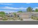 Charming single-story home with desert landscaping and a two-car garage at 2601 Harrisburg Ave, Henderson, NV 89052