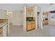 Kitchen nook with beautiful cabinets, tile flooring, and granite countertops at 2601 Harrisburg Ave, Henderson, NV 89052
