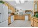 Bright kitchen features tile floors, granite countertops, and stainless steel appliances at 2601 Harrisburg Ave, Henderson, NV 89052