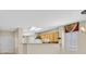Open-concept living space with adjacent kitchen and ample natural light at 2601 Harrisburg Ave, Henderson, NV 89052