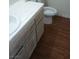 Bathroom featuring wood-look flooring and white vanity at 2725 S Nellis Blvd # 1158, Las Vegas, NV 89121