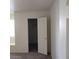Neutral bedroom features door to the walk-in closet at 2725 S Nellis Blvd # 1158, Las Vegas, NV 89121