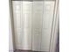 White closet doors with a traditional design and neutral walls and baseboards at 2725 S Nellis Blvd # 1158, Las Vegas, NV 89121