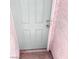 A close-up of the front door showing a modern doorknob and lock at 2725 S Nellis Blvd # 1158, Las Vegas, NV 89121